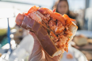 Close up of lobster roll at a restaurant in Boothbay Harbor.