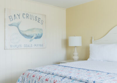 Main Inn Suite bedroom with whale artwork