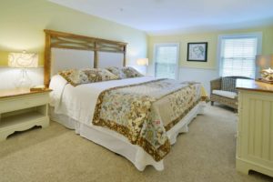 A photo of a guest room at a Maine resort to relax in after exploring spots like Cabbage Island.