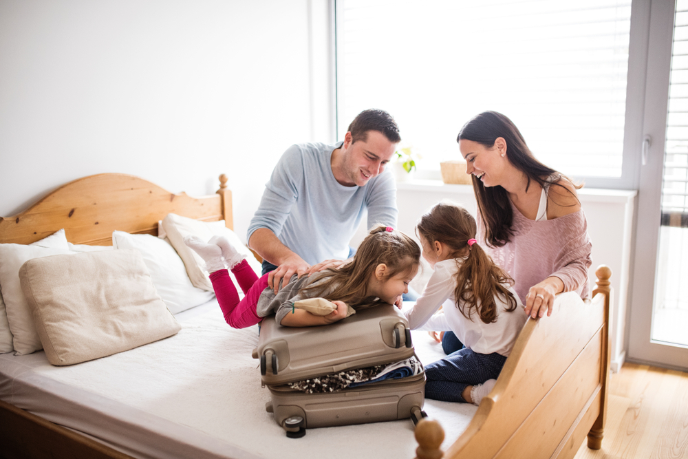 A family packing for their stay at one of the top family resorts in Midcoast Maine.