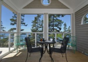 The porch of a Boothbay Harbor vacation rental to relax on after going on boat tours.