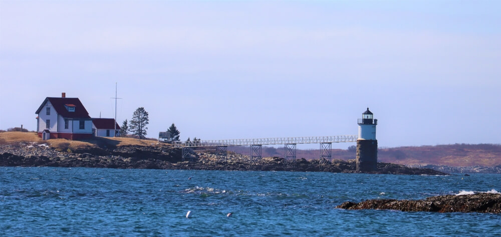 The view of a lighthouse, a top Midcoast Maine attraction.