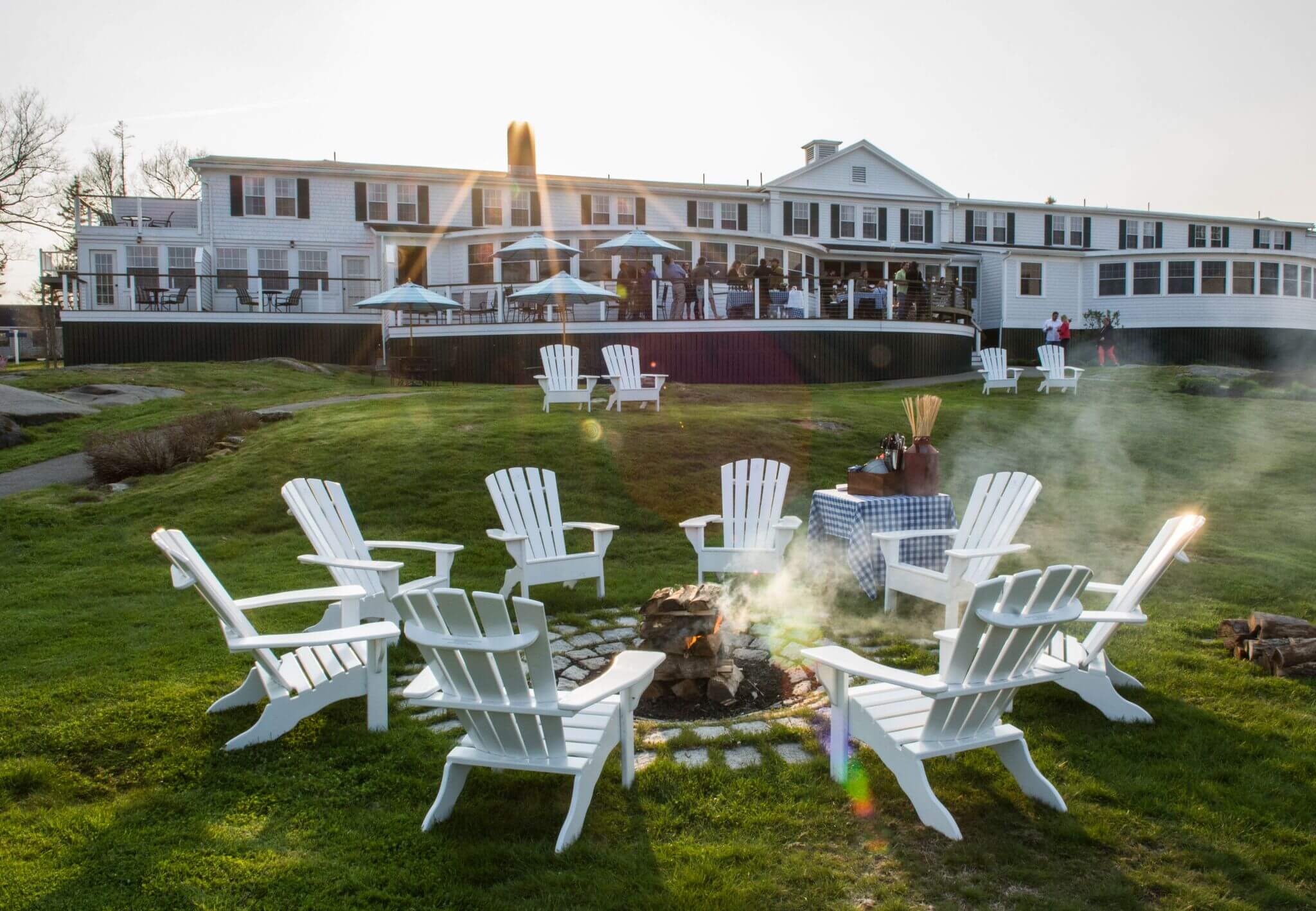 Chairs around a firepit at Linekin Bay Resort